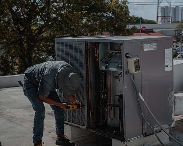 Professional technician completing careful on-site work